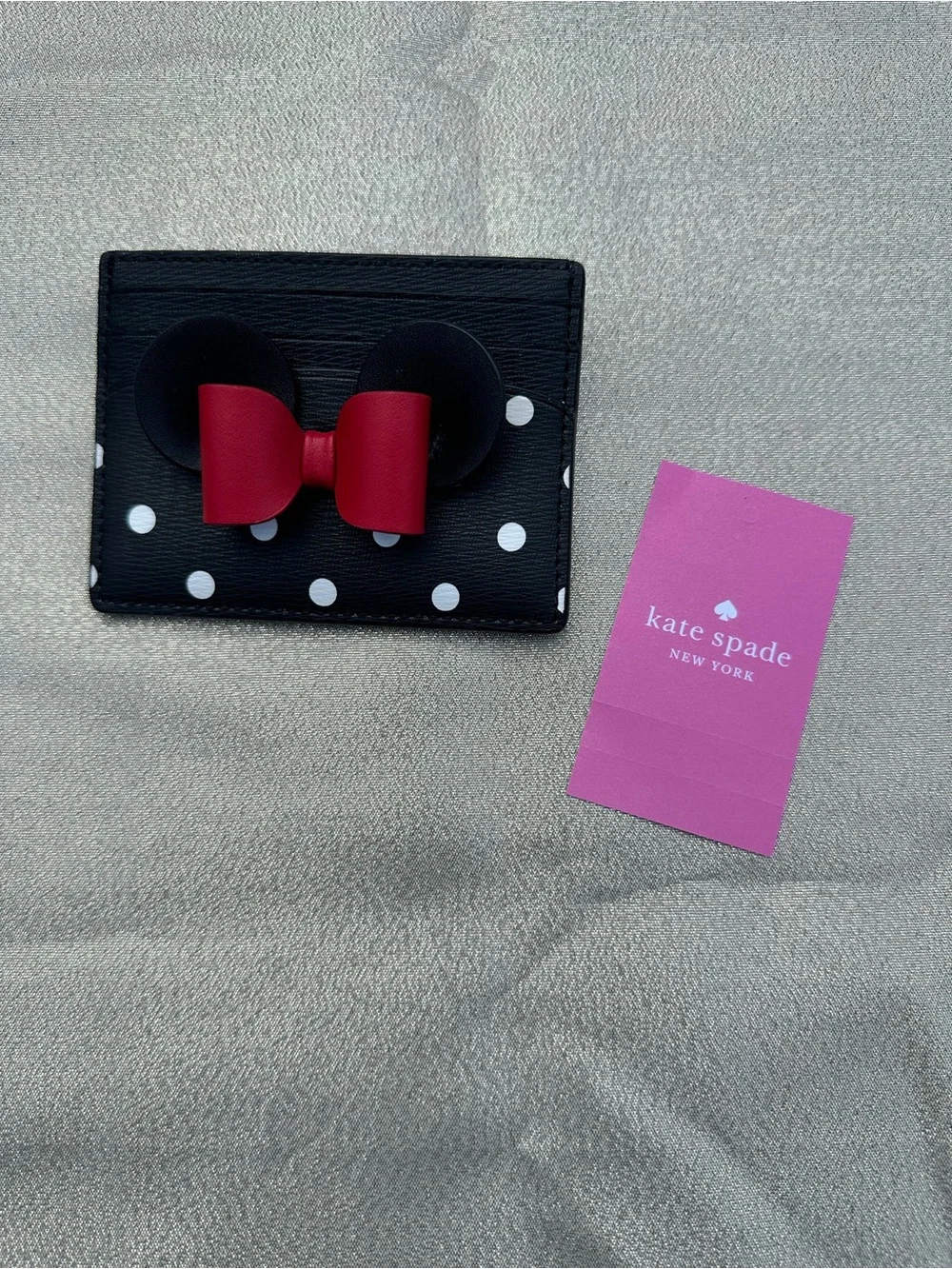 kate spade Black Polka Dot Card Case with Red Bow Accent